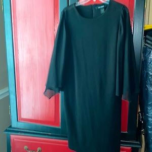 Elegant dress with sheer arms at flow